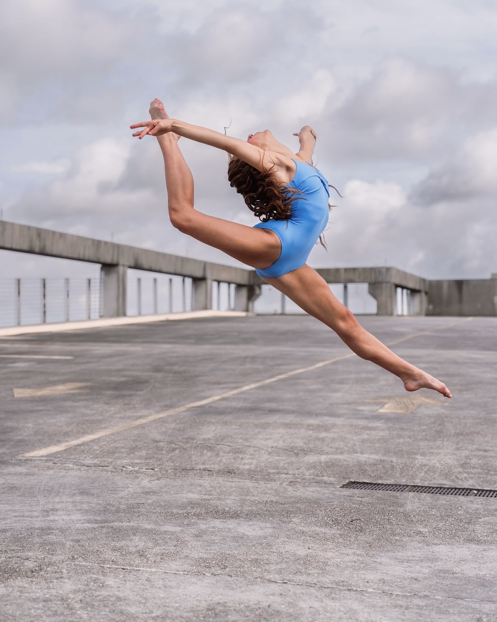 Chloe Marino performing an outdoor leap